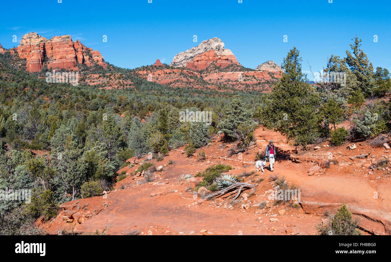 Hiker and dog on the Soldier Pass Trail in Sedona Stock Photo