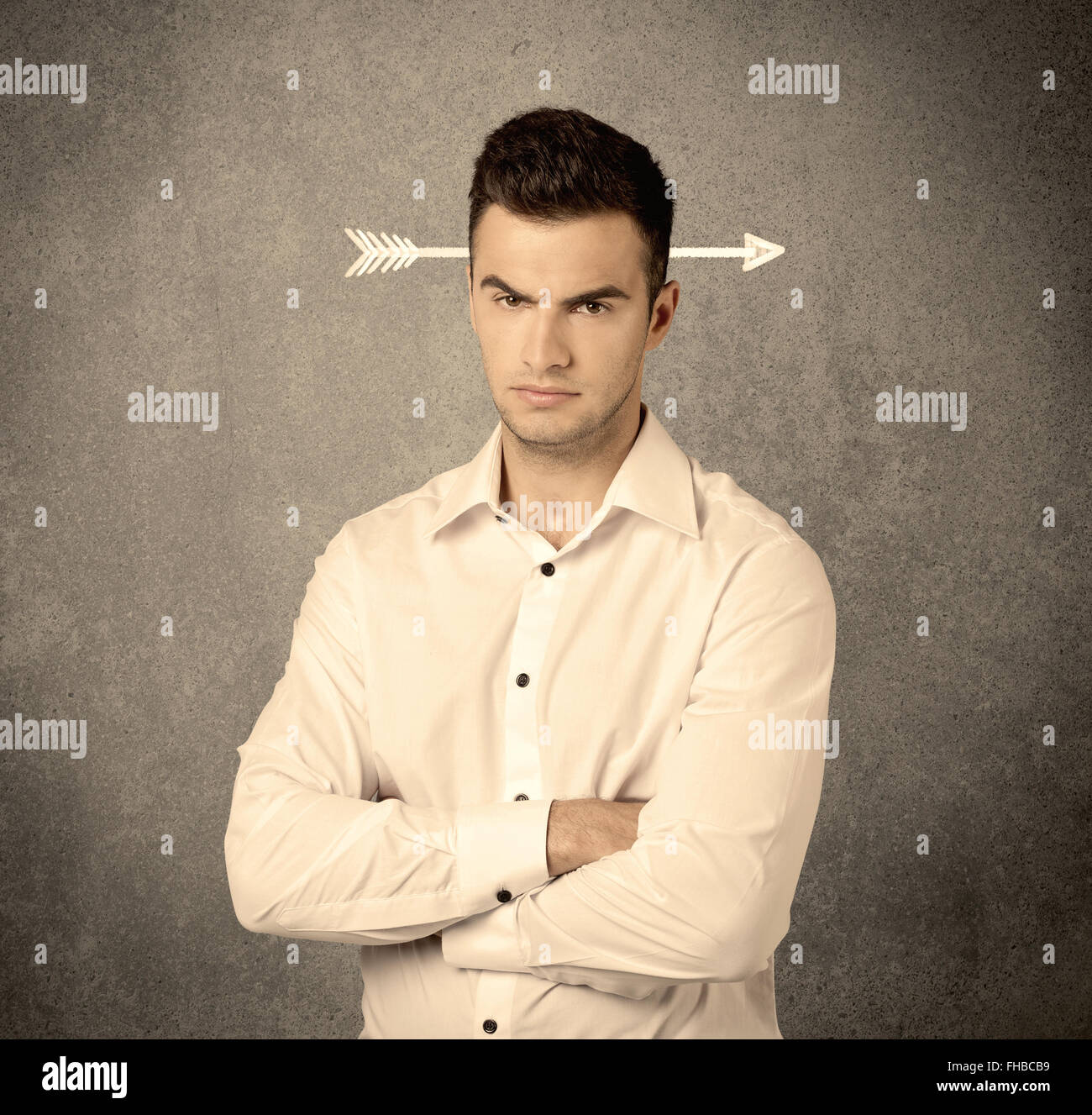 Young sales guy with arrow in the head Stock Photo - Alamy