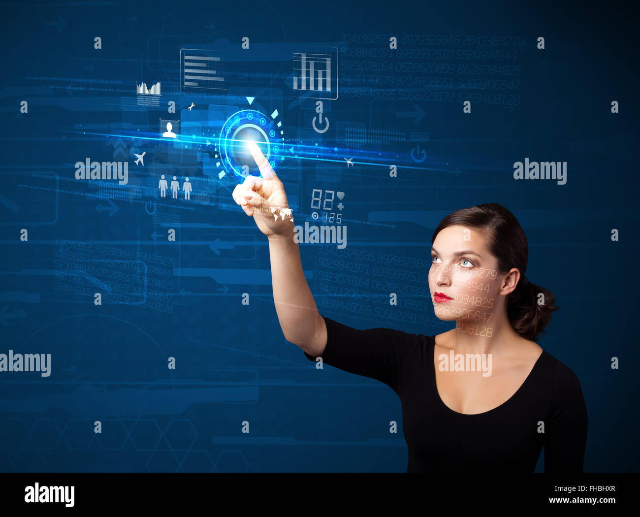 Young business woman touching future web technology buttons and icons ...