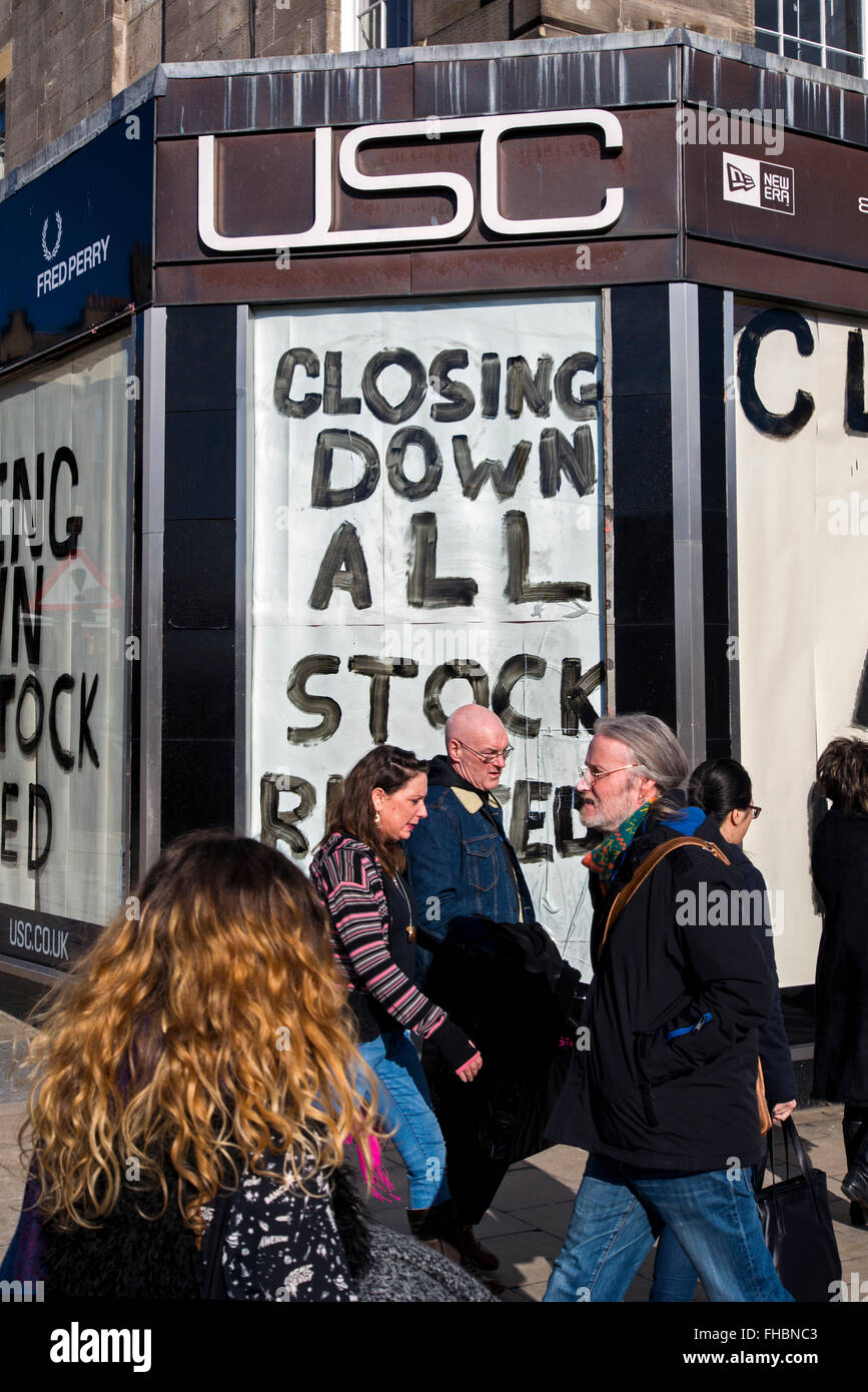 USC clothing store on Princes Street, Edinburgh, with closing down signs on the windows. Stock Photo