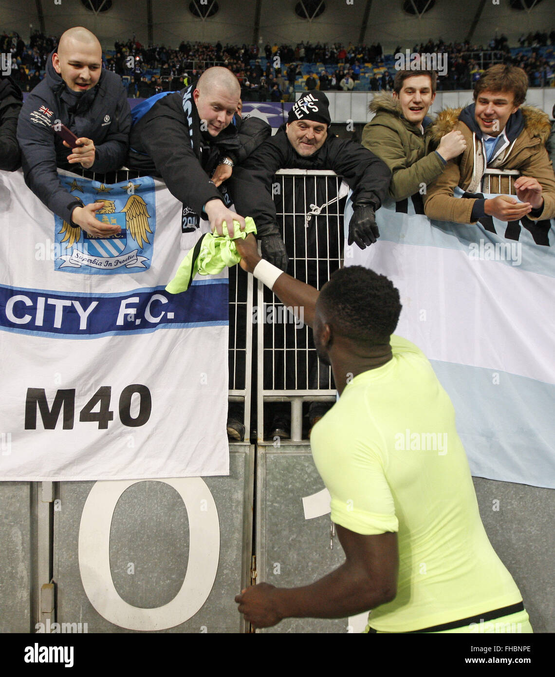 Kiev, Ukraine. 24th Feb, 2016. Manchester City's BACARY SAGNA celebrates with Manchester City's fans after the UEFA Champions league round of 16, first leg, football match FC Dynamo Kyiv vs Manchester City FC at the Olimpiysky stadium in Kiev, on February 24, 2016. Credit:  Serg Glovny/ZUMA Wire/Alamy Live News Stock Photo