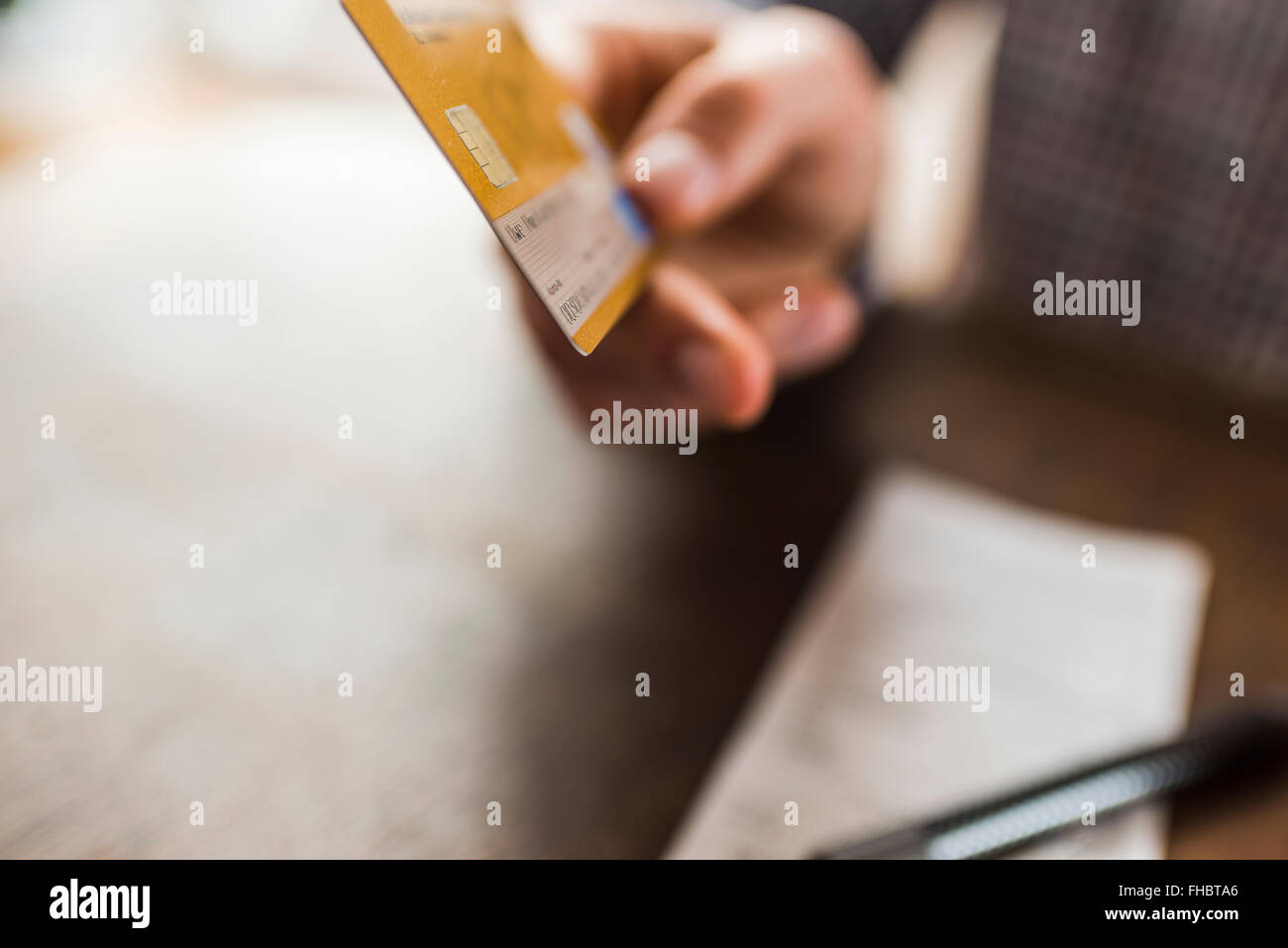 Close-up of hand holding credit card Stock Photo