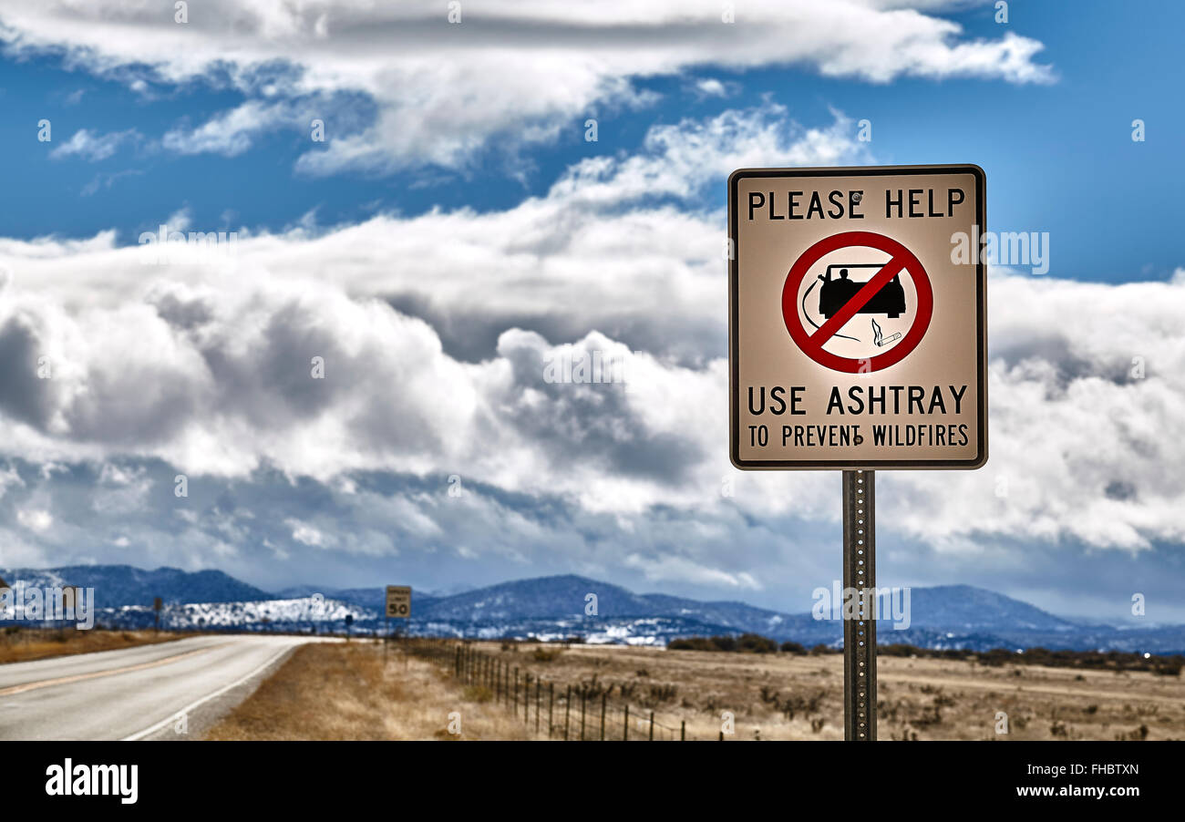 Road sign that says Please Help, don't throw cigarette butts out car