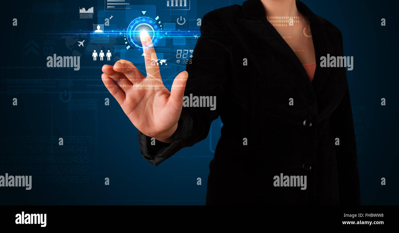 Young business woman touching future web technology buttons and icons ...