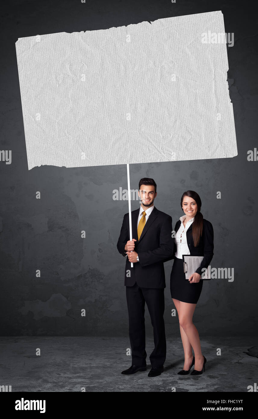 Business couple with blank booklet paper Stock Photo