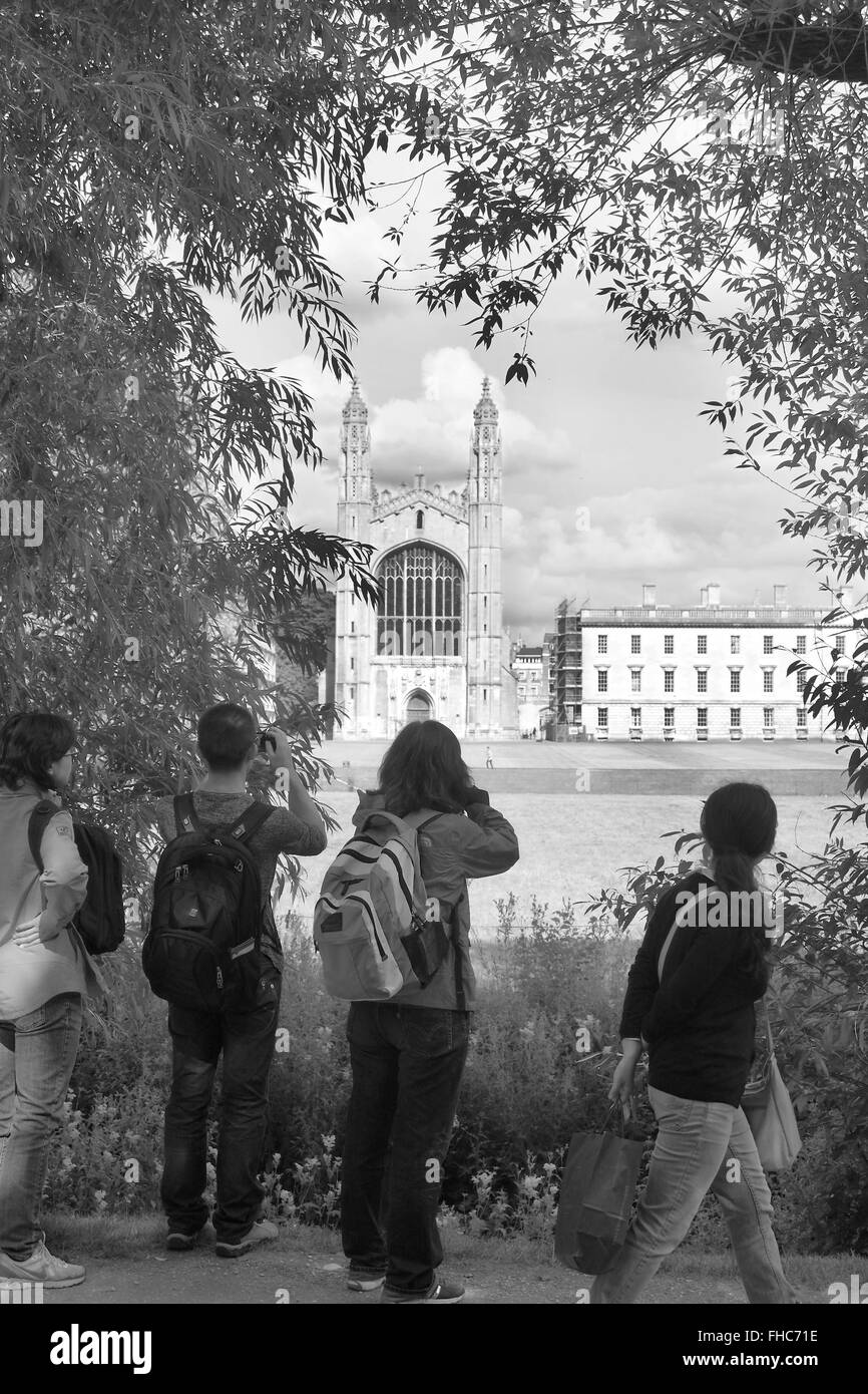 Tourists taking pictures of the famous view of the chapel at King's college  at Cambridge University. 6th July 2014 Stock Photo