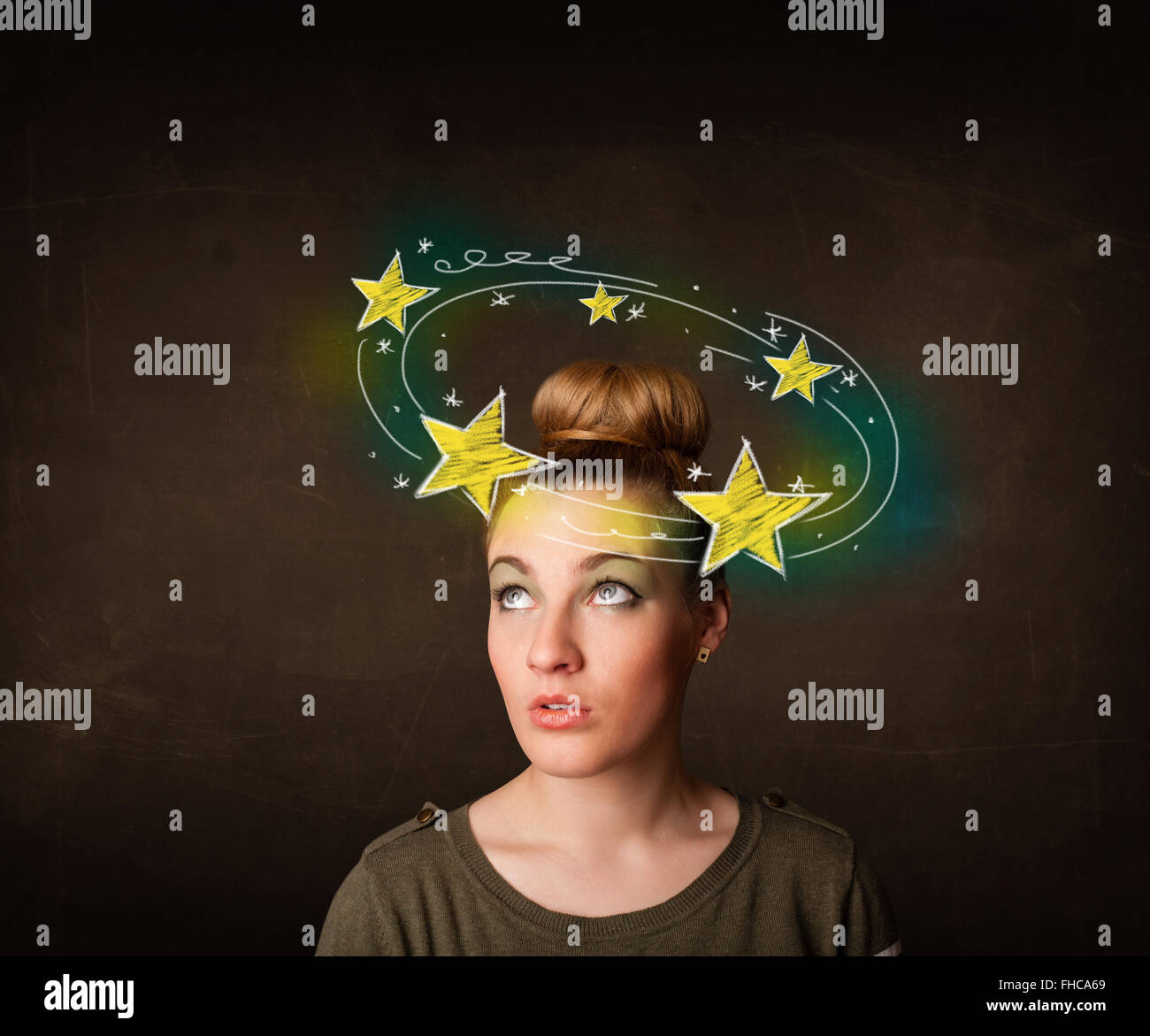 girl with yellow stars circleing around her head illustration Stock Photo