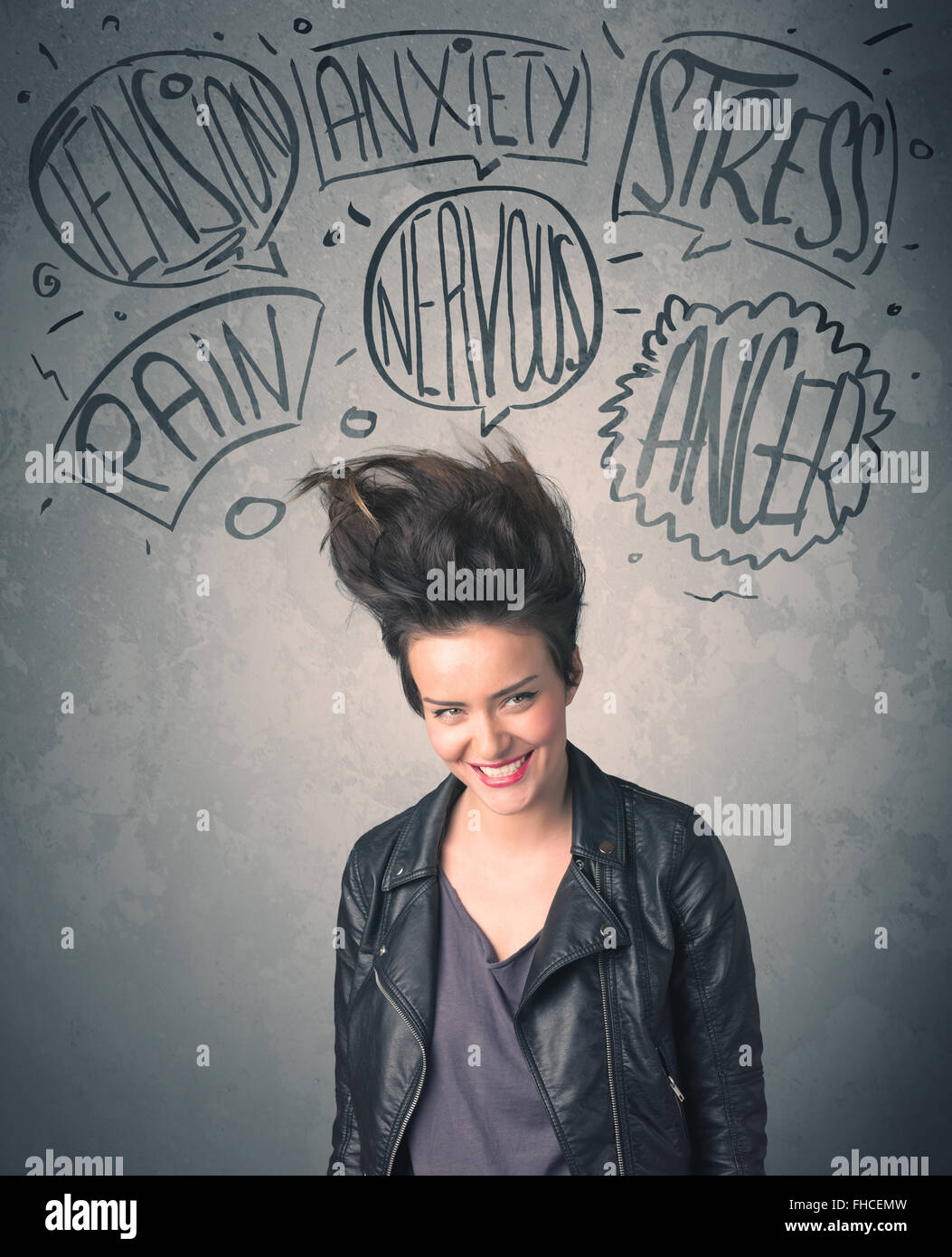 Mad young woman with extreme haisrtyle and speech bubbles Stock Photo