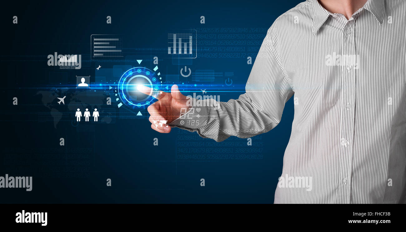 Handsome businessman touching future web technology buttons and icons ...