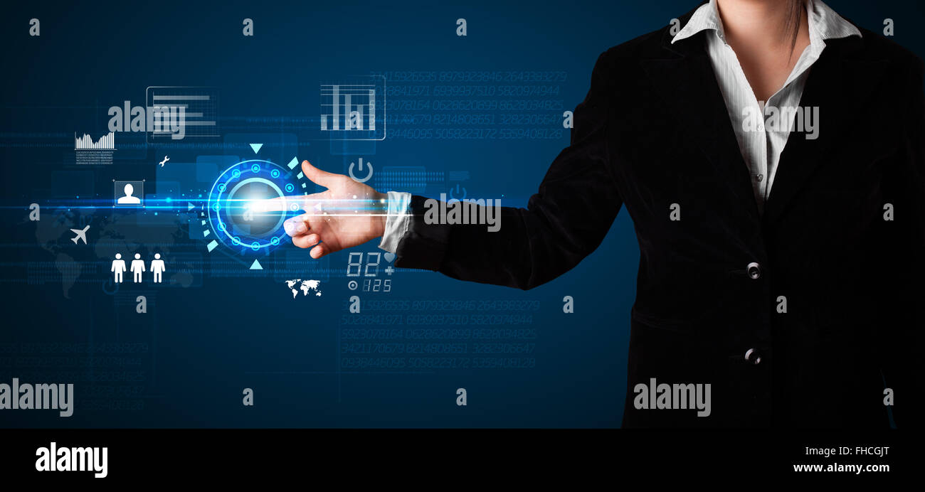 Young business woman touching future web technology buttons and icons ...