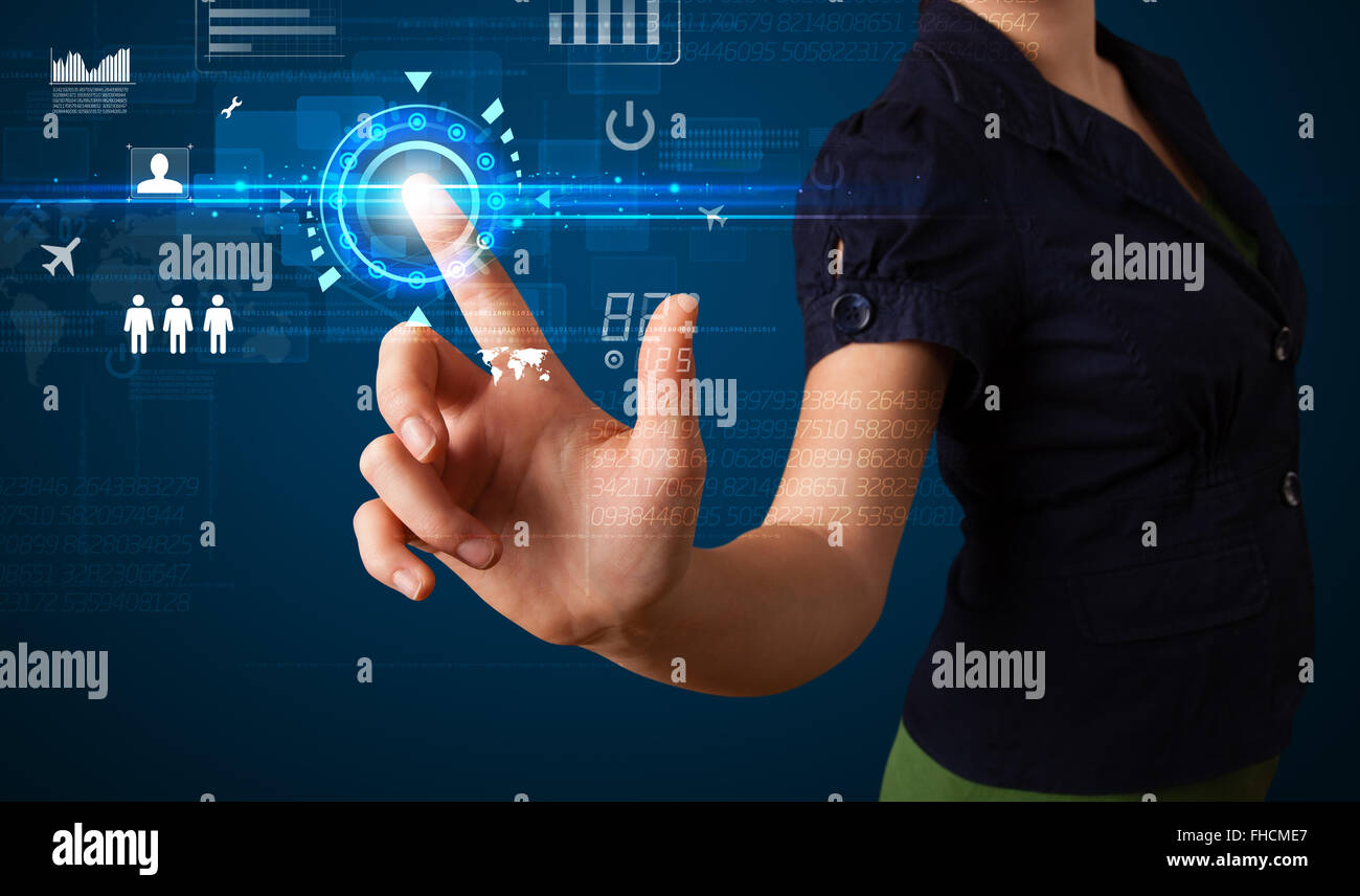 Young business woman touching future web technology buttons and icons ...