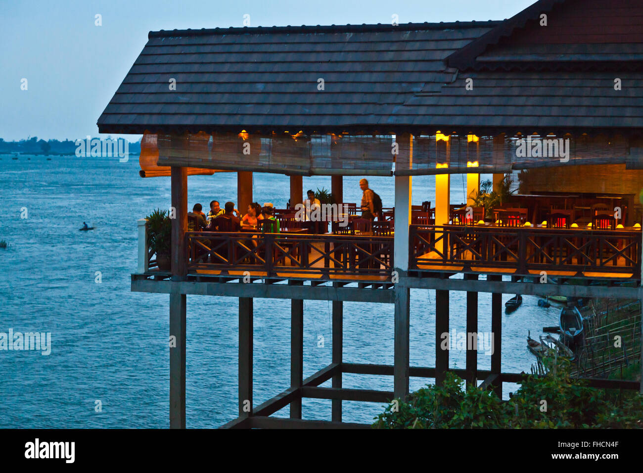 The PAN ARENA HOTEL RESTAURANT on DON KHONG ISLAND in the 10 Thousand Islands area of the Mekong River - SOUTHERN, LAOS Stock Photo