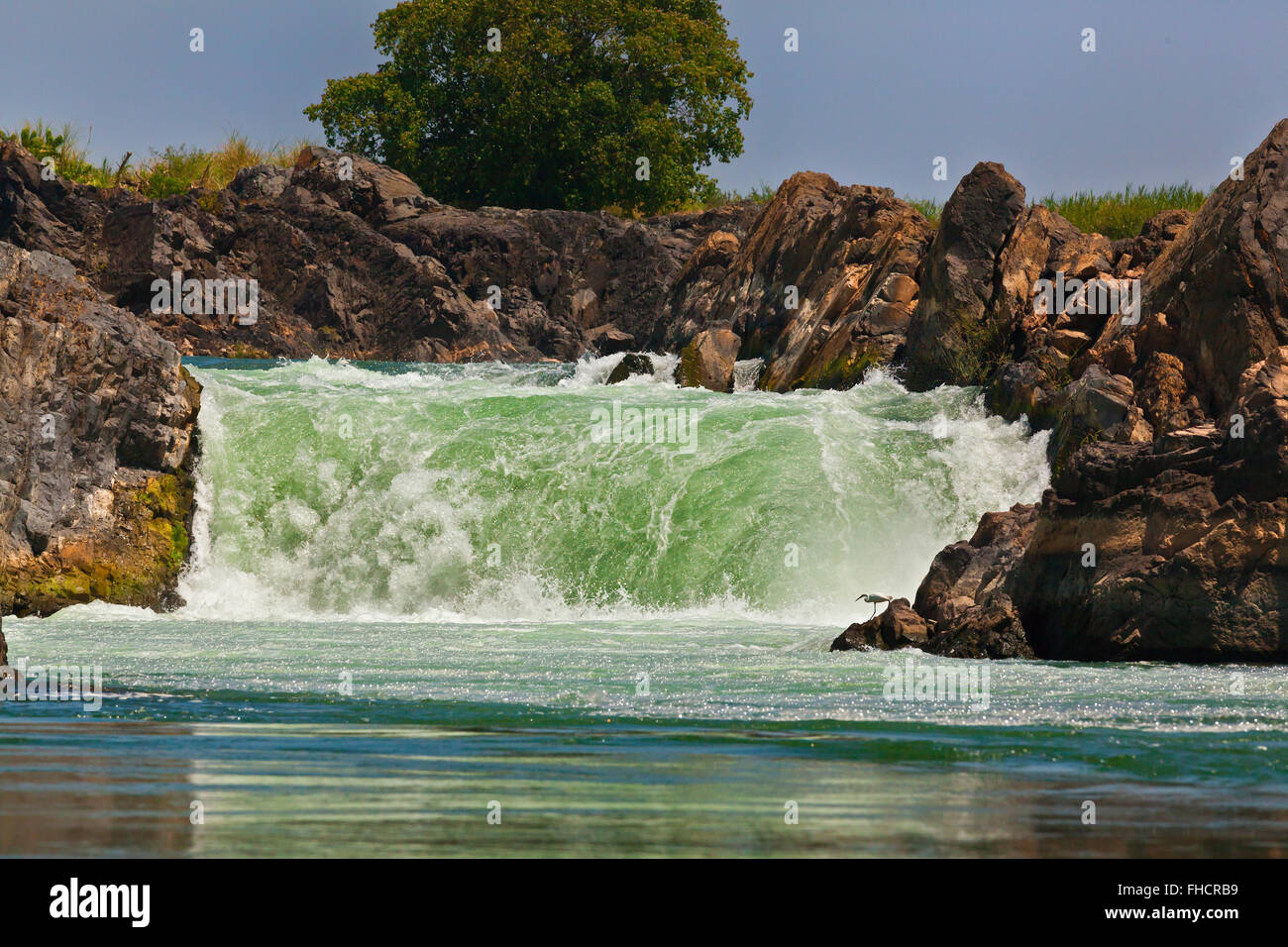 The TAM I DAENG WATERFALL is off the beaten track on the MEKONG RIVER in the 4 Thousand Islands Area (Si Phan Don) near DONE KHO Stock Photo