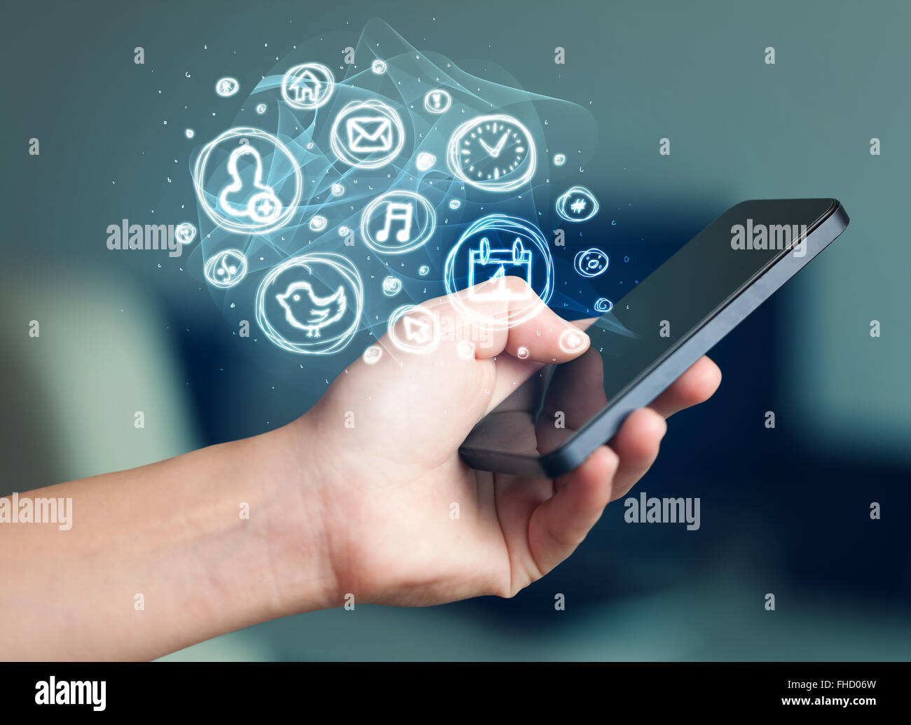 Hand holding smartphone with mobile app choices Stock Photo - Alamy