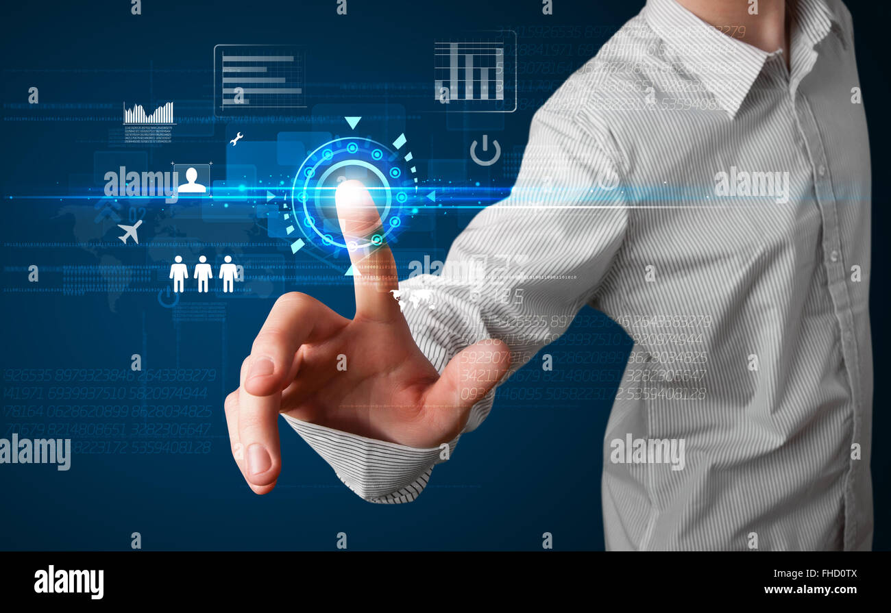 Handsome businessman touching future web technology buttons and icons ...
