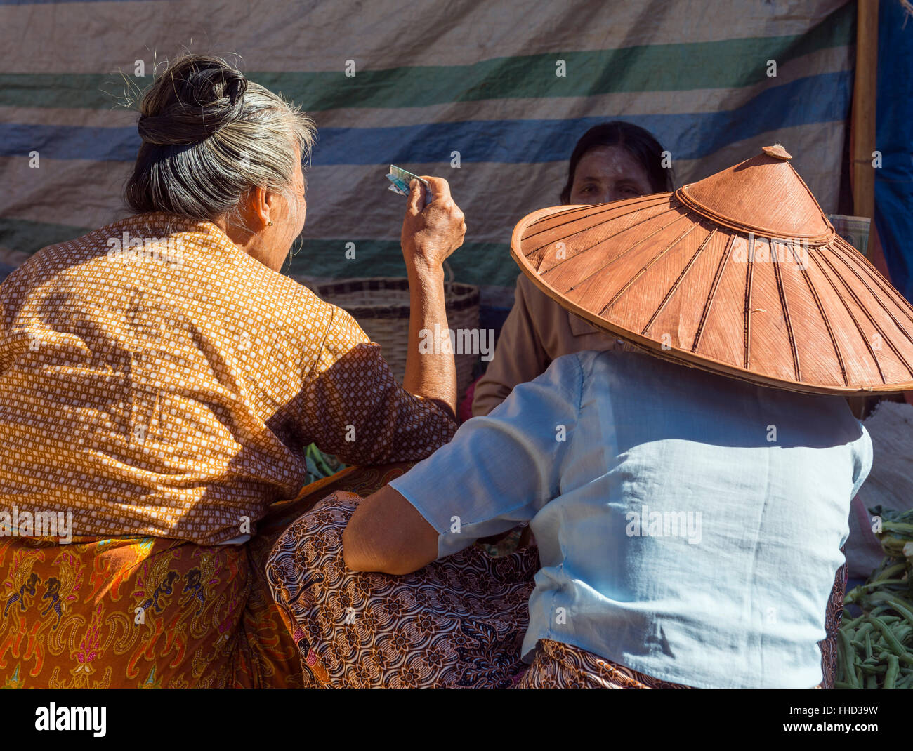 Wheeling and dealing at the market, Burma Stock Photo