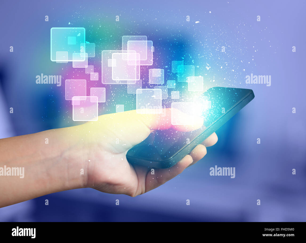 Hand holding smart phone with abstract glowing squares Stock Photo - Alamy