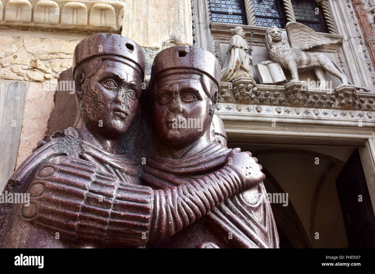 Detail from Monument of Four Tetrarchs and Porta della Carta, at the corner of Saint Mark Basilica in Venice, italy Stock Photo