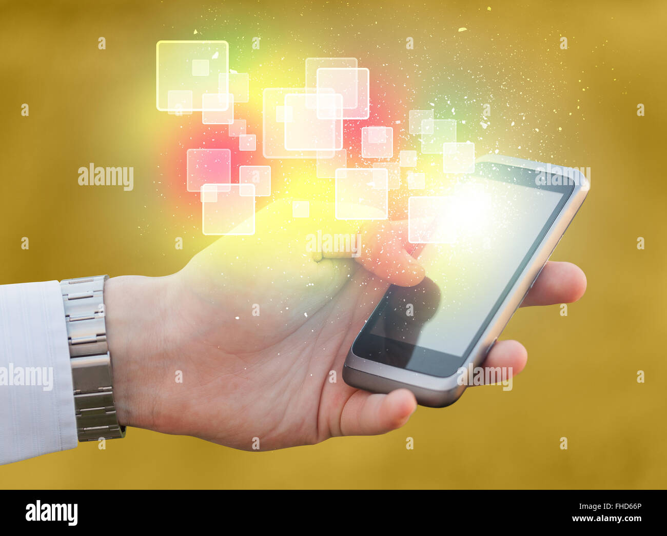 Hand holding smart phone with abstract glowing squares Stock Photo - Alamy
