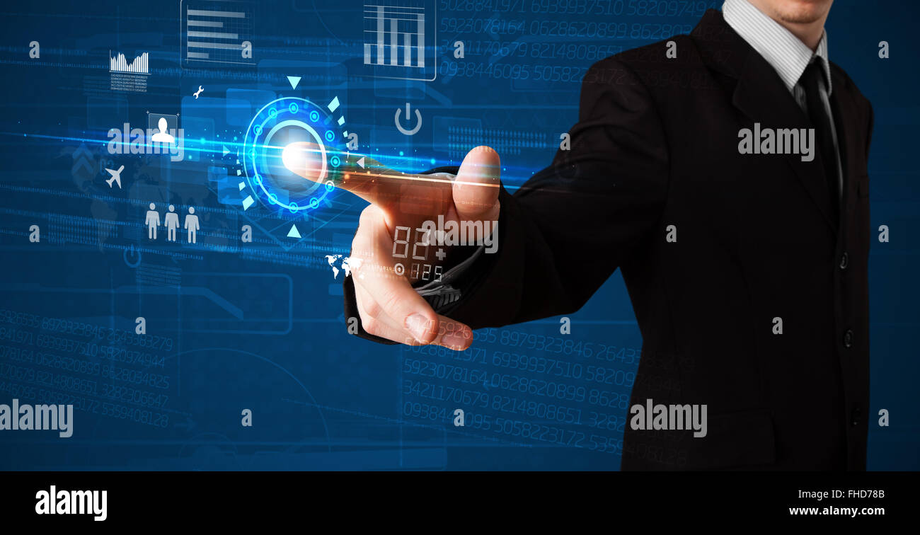 Handsome businessman touching future web technology buttons and icons ...
