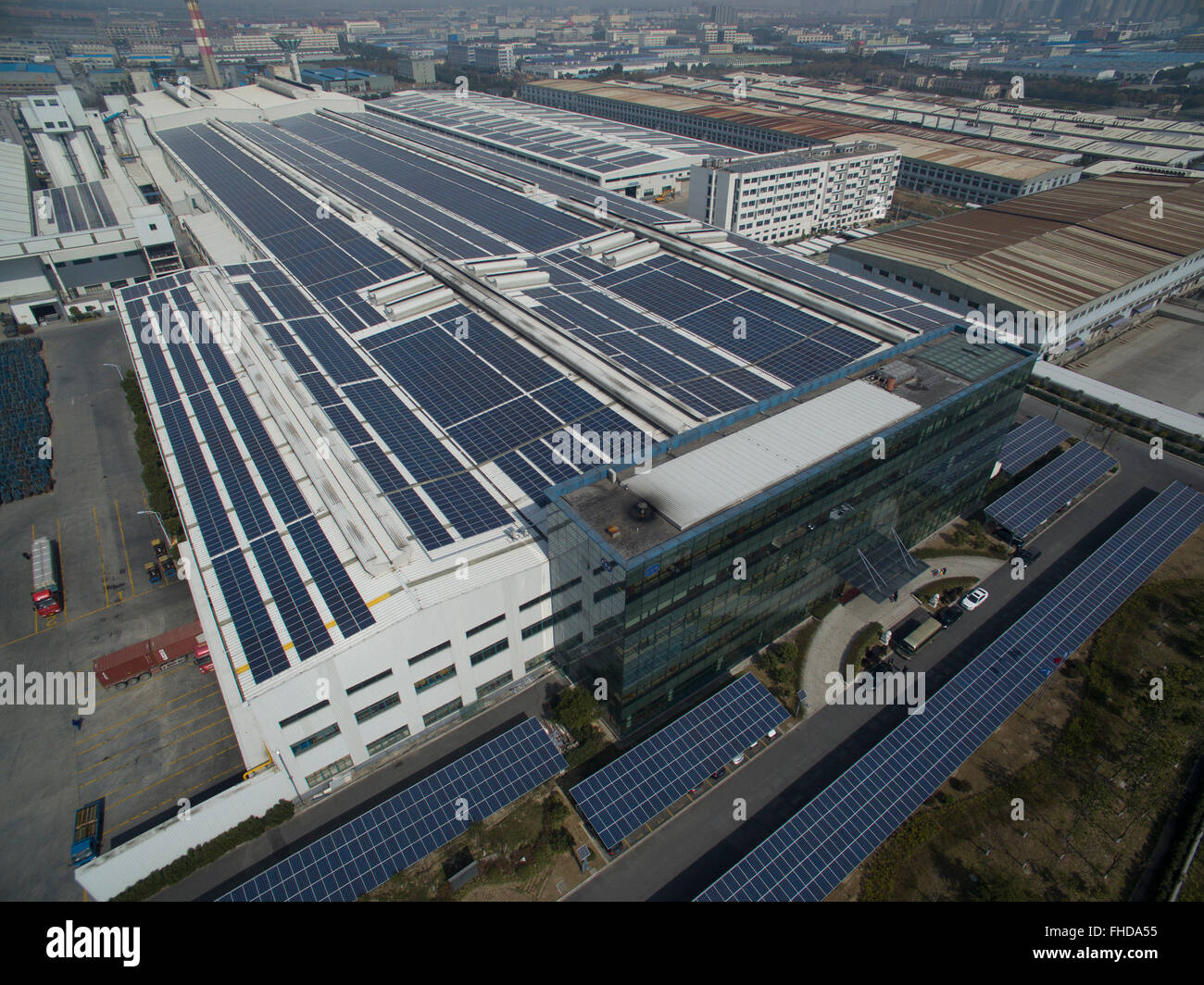 Beijing, China. 18th Feb, 2016. An aerial photo taken on Feb. 18, 2016 shows a photovoltaic PV power project in Xiuzhou District of Jiaxing City, east China's Zhejiang Province. Many towns in Zhejiang Province succeeded in developing urbanizaiton by upholding the concepts of innovation, coordination, greenness, openness and sharing. © Huang Zongzhi/Xinhua/Alamy Live News Stock Photo