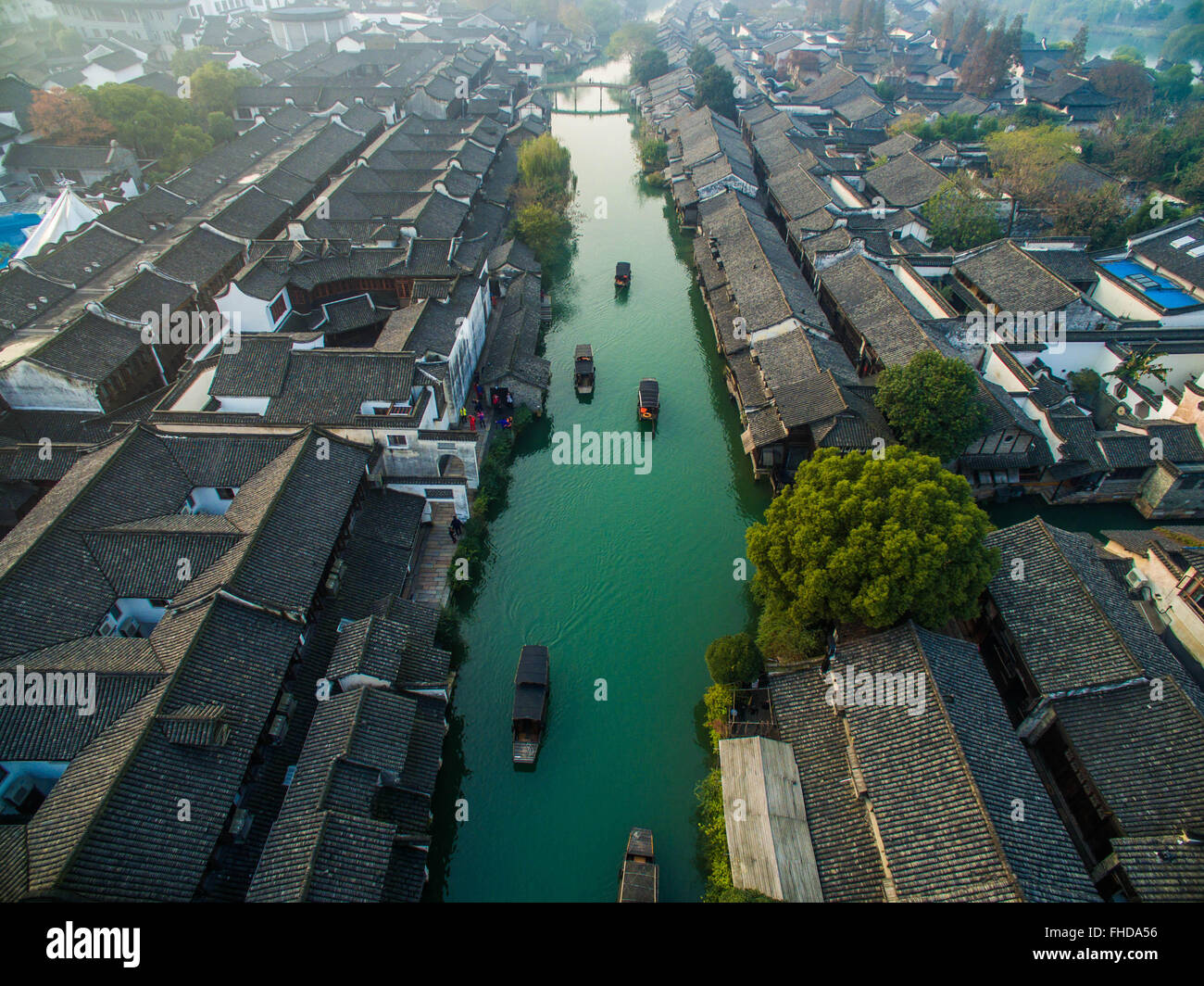 Beijing, China. 8th Dec, 2015. An aerial photo taken on Dec. 8, 2015 shows the scenery of Wuzhen Township, east China's Zhejiang Province. Many towns in Zhejiang Province succeeded in developing urbanizaiton by upholding the concepts of innovation, coordination, greenness, openness and sharing. © Xu Yu/Xinhua/Alamy Live News Stock Photo