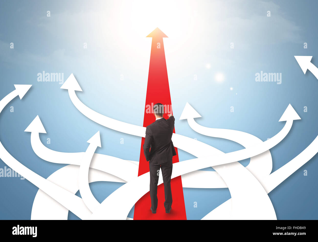 businessman with different direction arrows Stock Photo