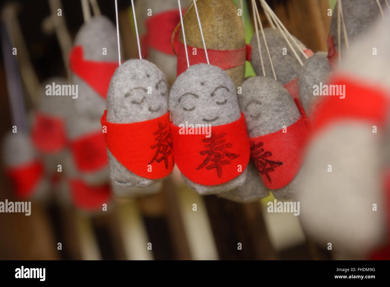 Protection dolls at a Japanese temple Stock Photo