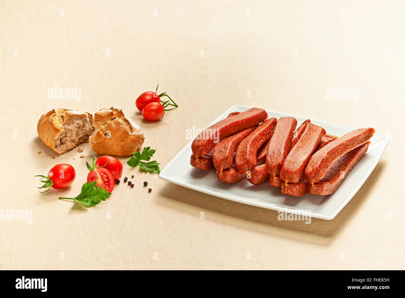 Landjaeger, pork sausages on plate Stock Photo Alamy