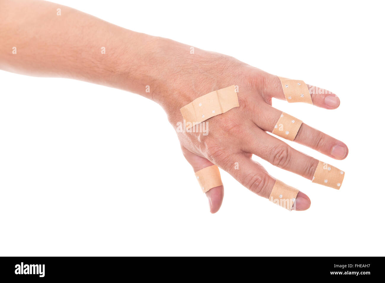 Hand putting adhesive bandage or plaster. band-aid on a cut. isolated on  white. Stock Photo by ©wittayayut 104522708