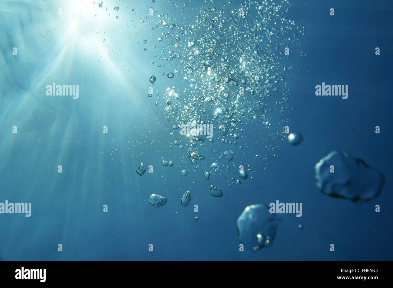 Underwater bubbles with sunlight through water surface, natural scene, Caribbean sea Stock Photo