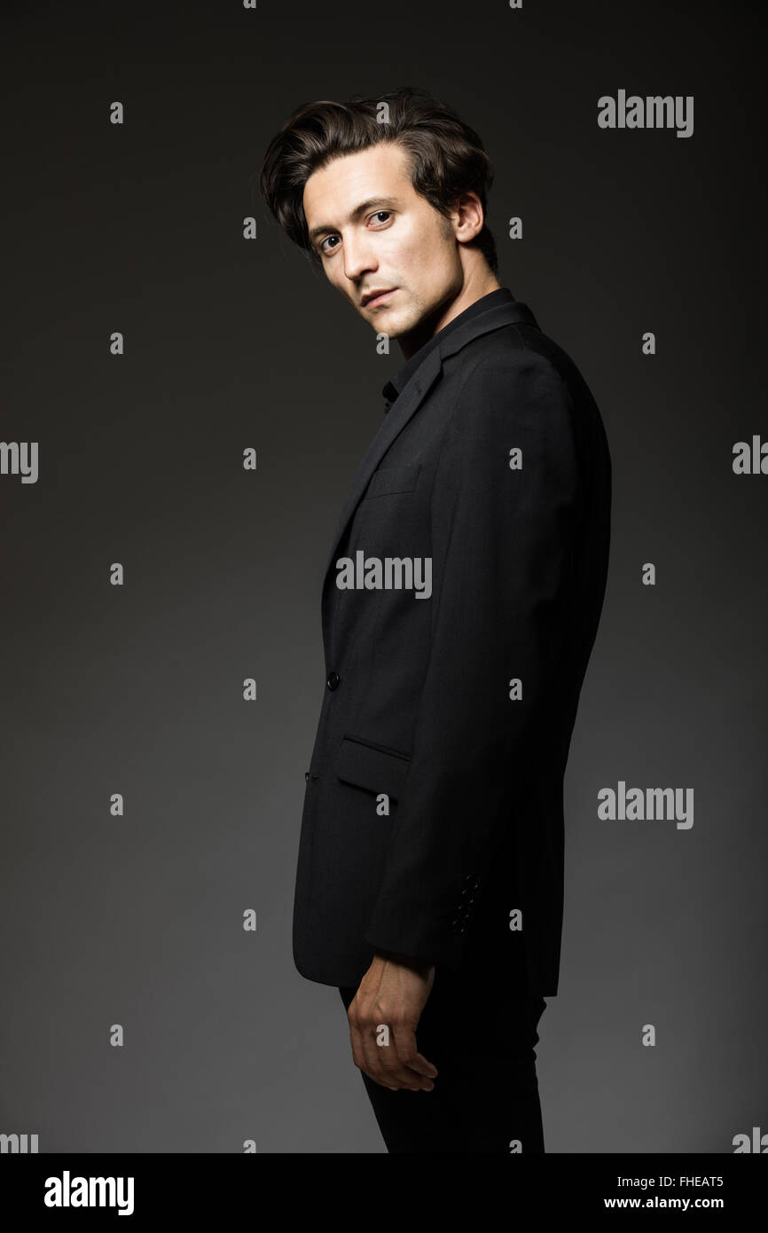 Dark black suit hi-res stock photography and images - Alamy