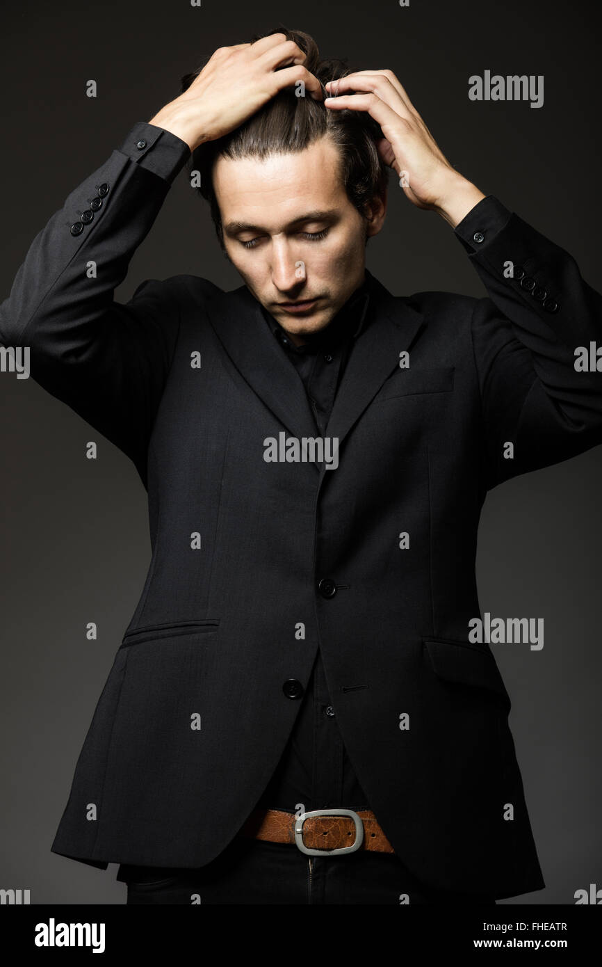 Man black suit hi-res stock photography and images - Alamy