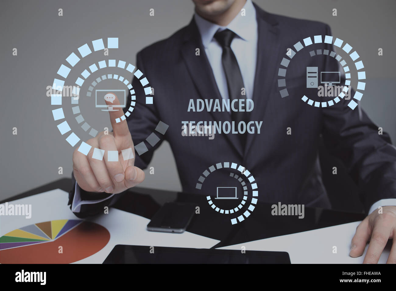 hand pushing advanced technology button on a touch screen interface ...