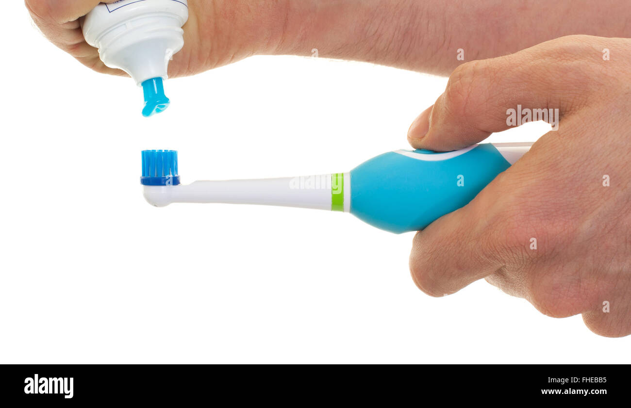 Electric toothbrush isolated on a white background Stock Photo - Alamy