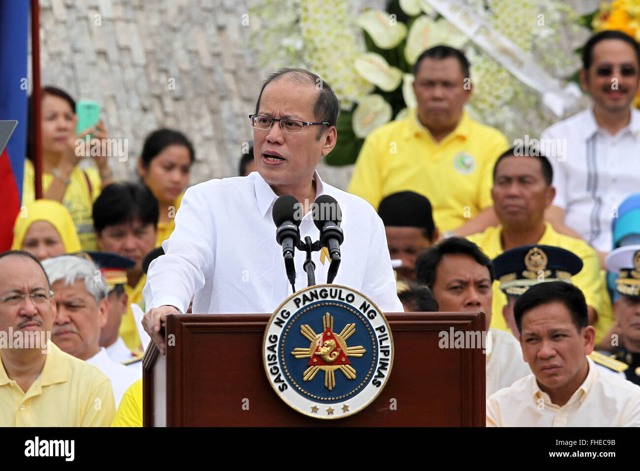 Quezon City, Philippines. 25th Feb, 2016. Philippine President Benigno S. Aquino III speaks during the 30th anniversary of the People Power Revolution in Quezon City, the Philippines, Feb. 25, 2016. Filipinos on Thursday celebrated the 30th anniversary of the People Power Revolution, an event that toppled the dictatorship of former President Ferdinand Marcos in 1986. Credit:  Rouelle Umali/Xinhua/Alamy Live News Stock Photo