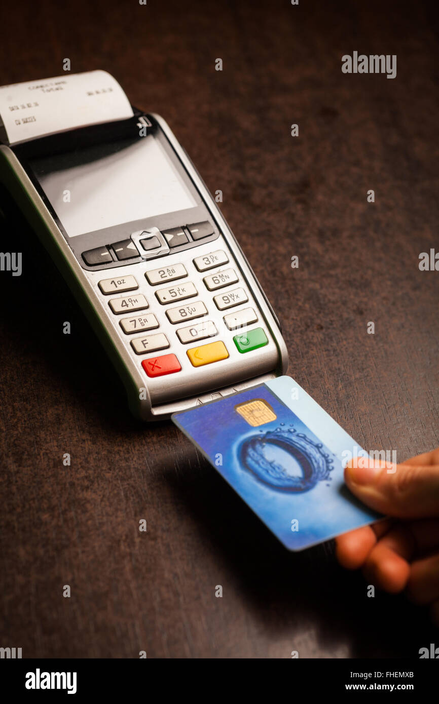 Color image of a POS and credit cards Stock Photo - Alamy