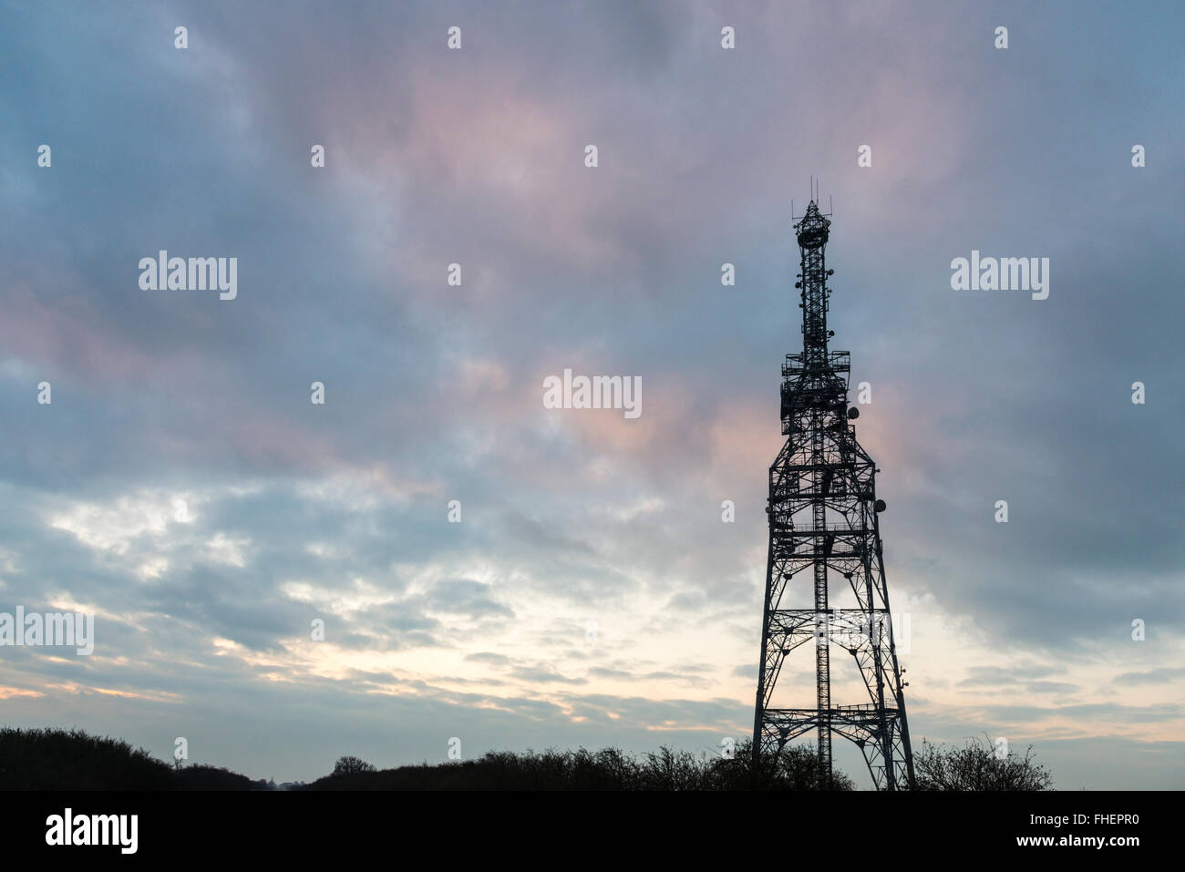 Cambridgeshire, UK. 25th February, 2016. There was a cloudy and overcast start to the day at a communications aerial on the outskirts of the village of Over in Cambridgeshire and the weather was warmer than forecast. Instead of the forecast sharp frost, cloud cover kept temperatures just over freezing. Credit: Julian Eales/Alamy Live News Stock Photo