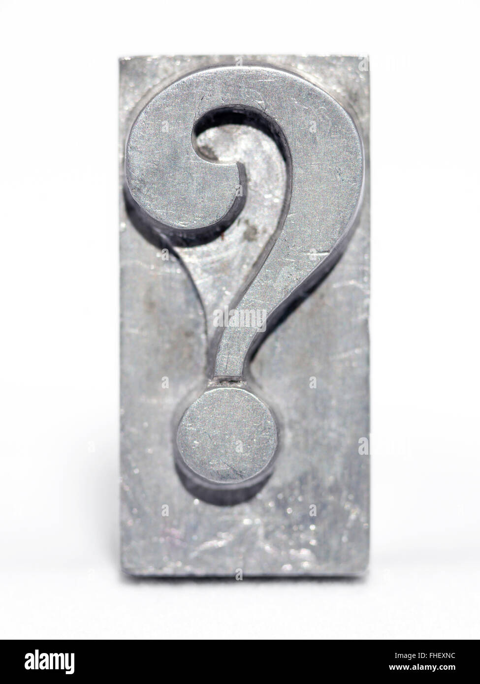 question mark metallic letterpress type block front view isolated on white Stock Photo