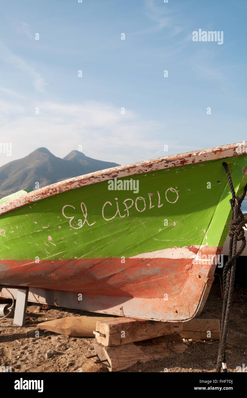 Detail of small fishing boat, El Cipollo with the volcanos of El Fraile n El Fraile Chico in the background, Cabo de Gata, Spain Stock Photo