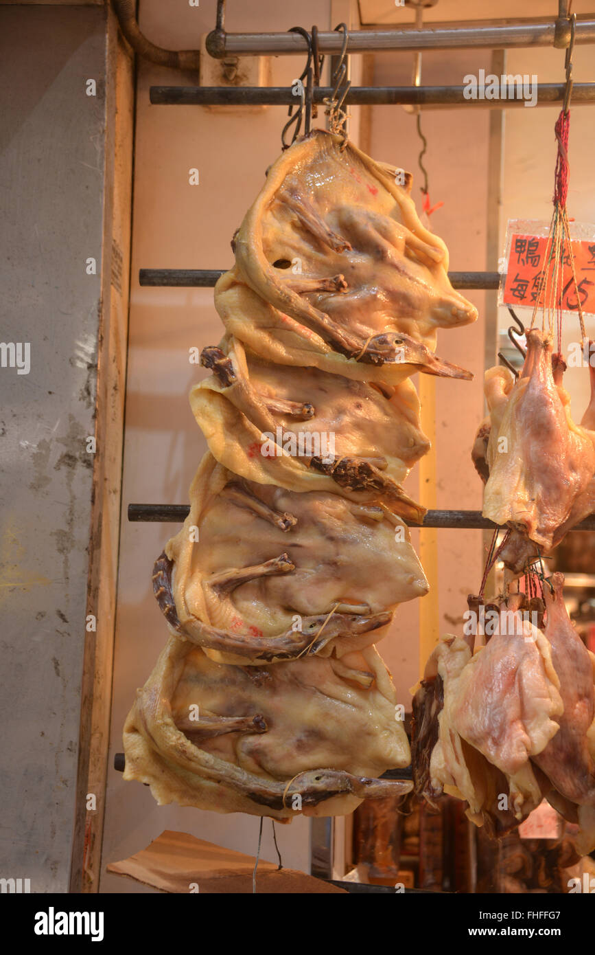 Flat ducks hanging in restaurant, Kowloon, Hong Kong Stock Photo