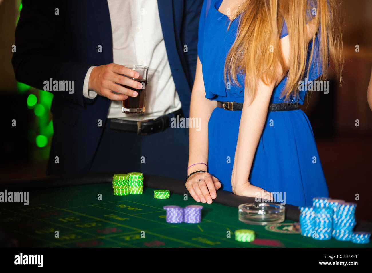 green roulette table with collored chips ready to play Stock Photo Alamy