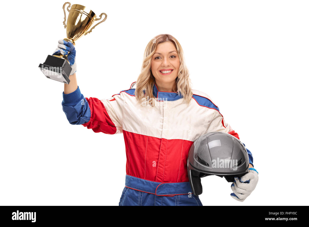 Female car racing champion holding a trophy and looking at the camera isolated on white background Stock Photo