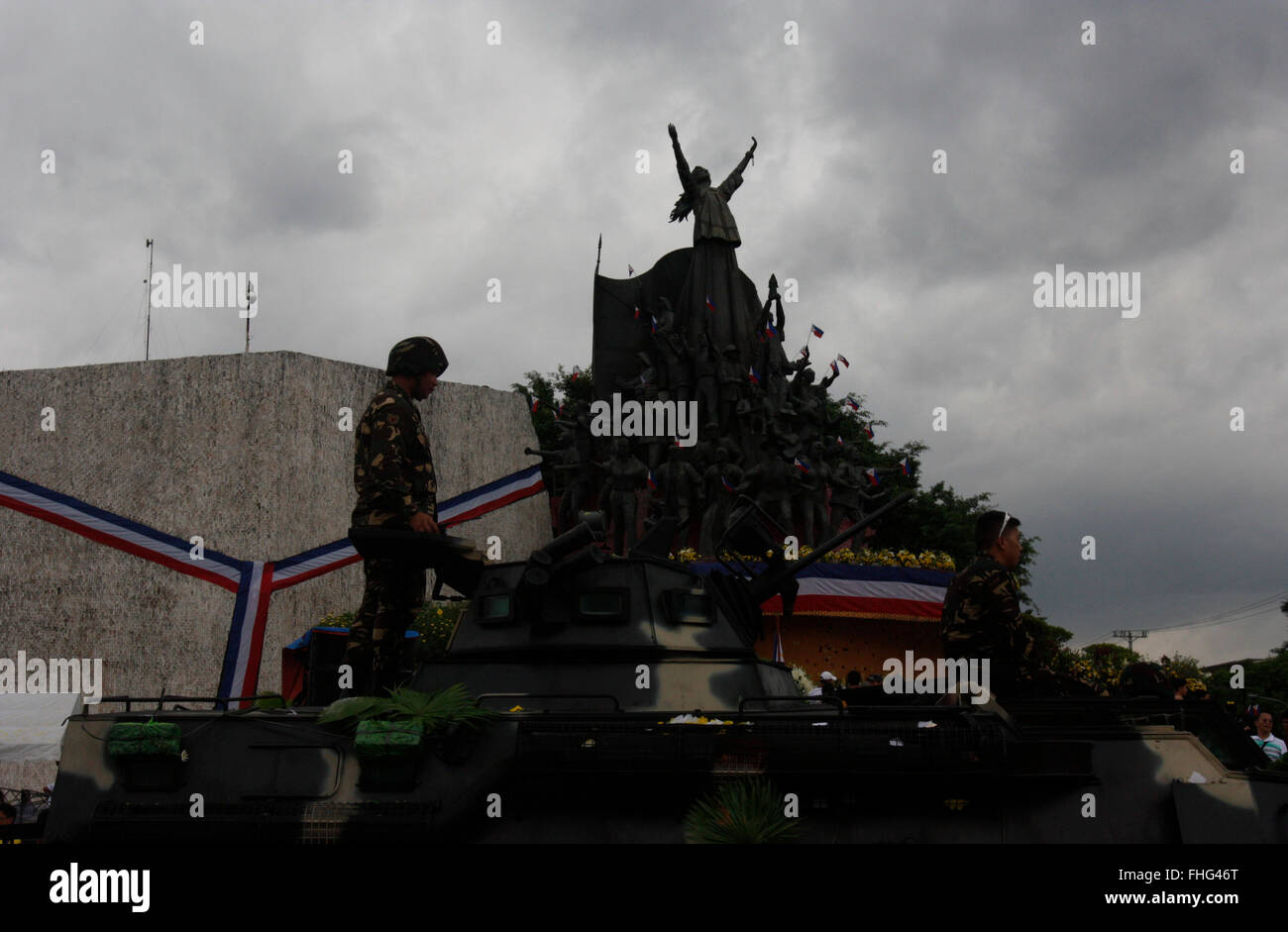 A Filipino soldier stands on a military tank during the celebration of 30th anniversary of EDSA People Power Revolution. The popular uprising of 1986 ended the two decades dictatorial rule of late Ferdinand Marcos. President Aquino in his speech hit the Marcos family in refusing to apologize to Martial Law victims. Marcos’ son, Bongbong Marcos, a current senator is running for vice president in the coming May 9 elections. Martial Law victims were campaigning to oppose Sen. Marcos’ vice presidential bid, a way for his family to return in power. (Photo by Marlo Cueto / Pacific Press) Stock Photo