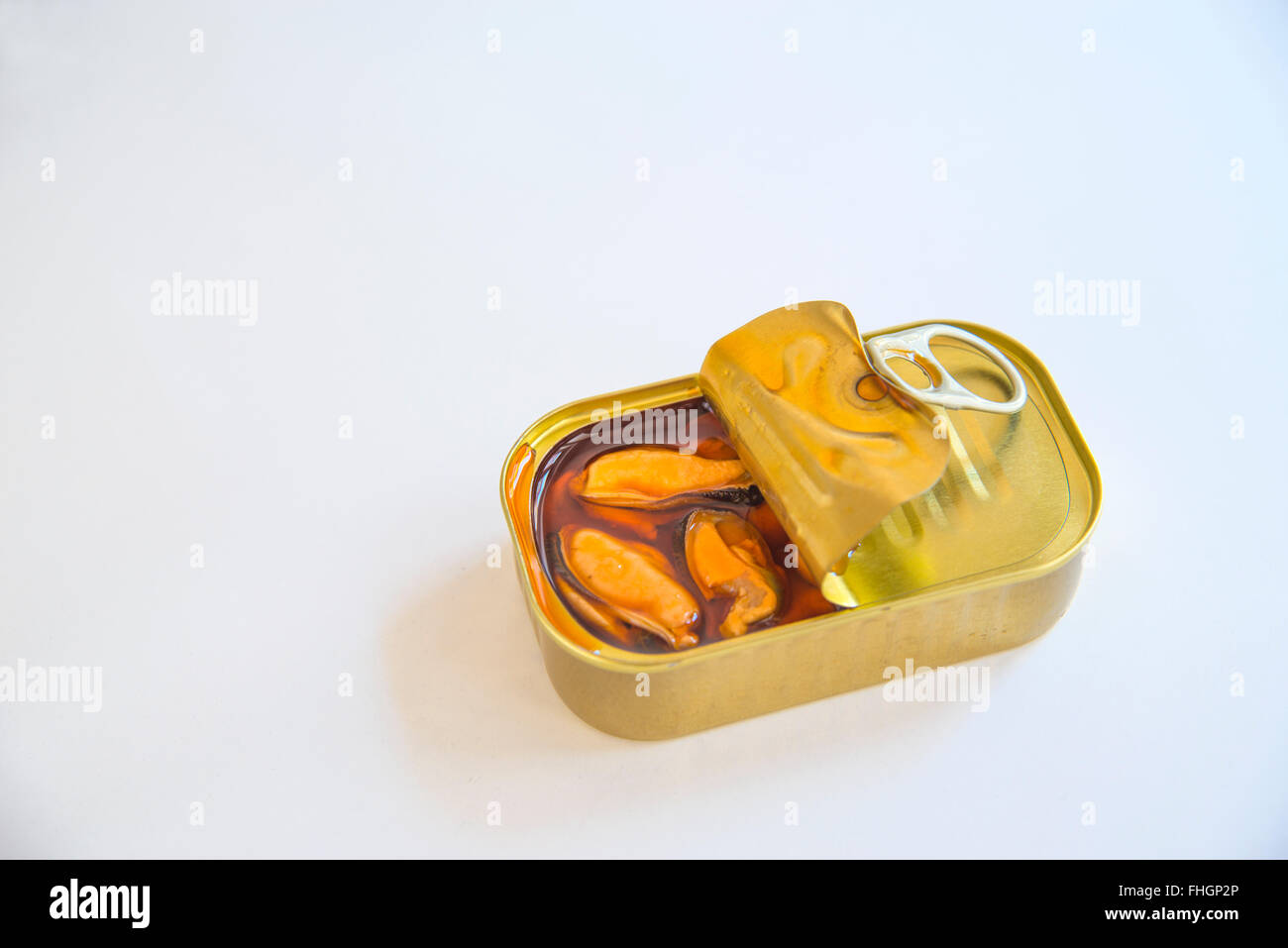 Tin of marinade mussels. Stock Photo