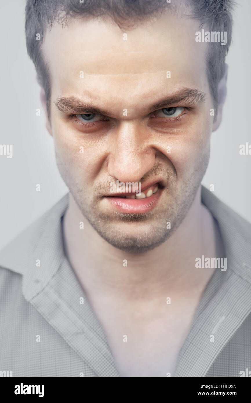 Face of evil angry scary man Stock Photo