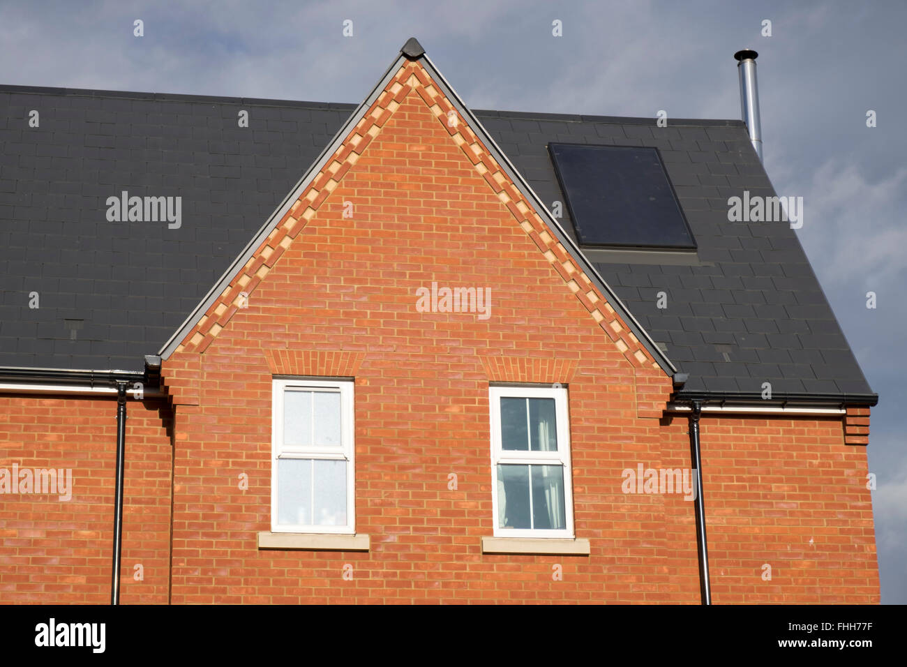 Residential property with built-in solar energy panels Ipswich Suffolk UK Stock Photo