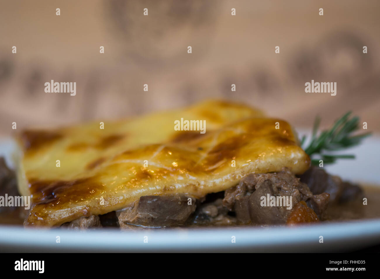 Steak and kidney pie. French restaurant prepared cuisine influenced by ...