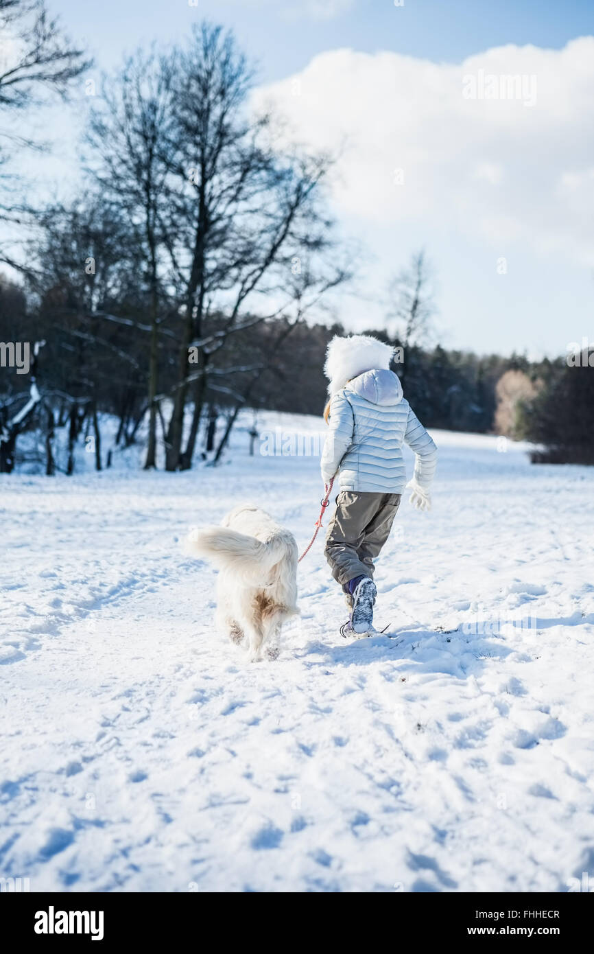 Girl walking dog hi-res stock photography and images - Alamy