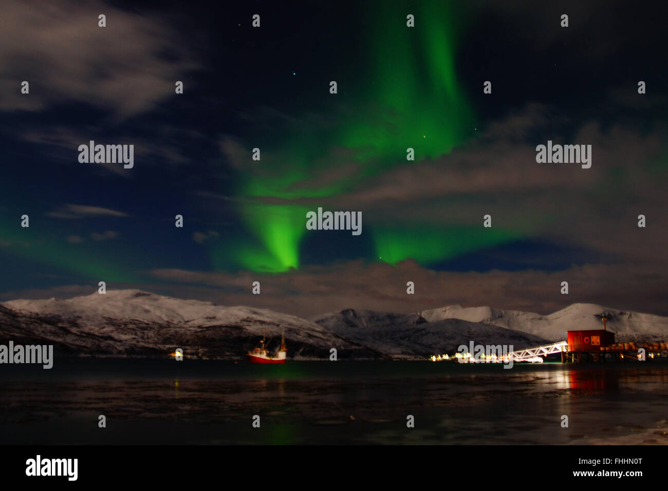 Aurora Borealis over a fjord near Tromso, Norway Stock Photo - Alamy